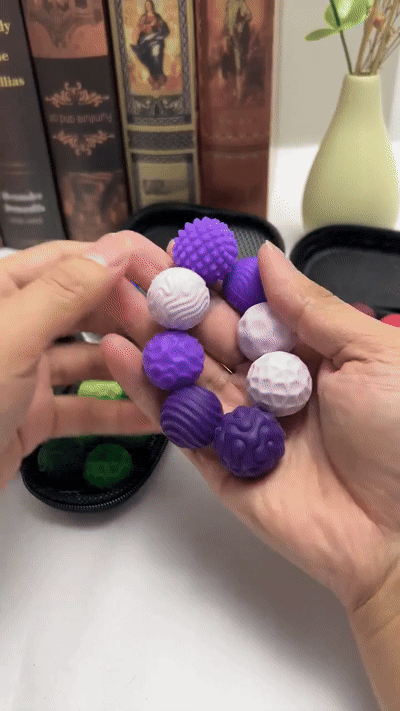 Silent magnetic tactile fidget in use